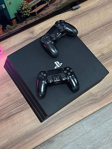 ucuz playstation 4: Sony PlayStation 4 Pro oyun konsolu 2 pultla prosifkalı model — 1
