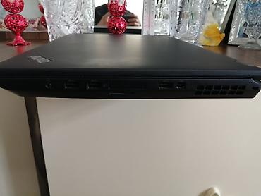 lenova thinkpad: Lenovo ThinkPad noutbuku (ThinkPad loqosu görünür). Geniş port seçimi — 1