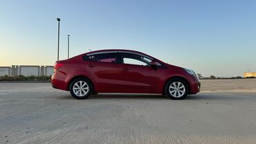 Kia: Kia Pride: 1.4 l | 2013 il Sedan — 11