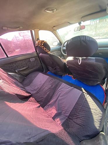 Другие автомобили: Седан компакт-класса, 4 двери, темно-фиолетовый цвет. Кузов с — 2