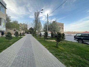 Kommersiya daşınmaz əmlakının satışı: Köhnə Günəşlidə əsas yolun kənarında, 9 mərtəbəli binanın — 5