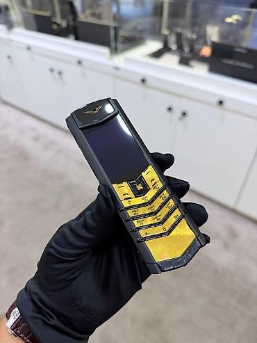 qizil nomreler: Vertu 4 GB, rəng - Qızılı, Düyməli — 4