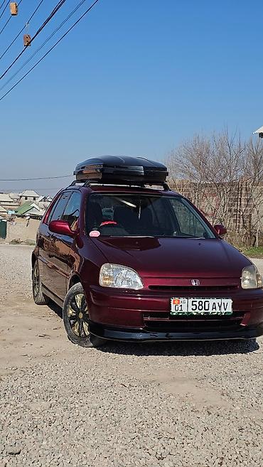 Honda: Honda Logo: 2000 г., Хэтчбэк — 2