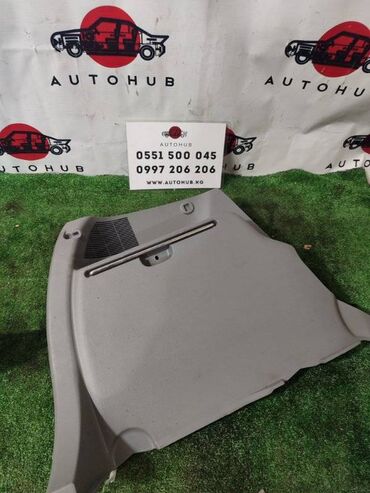 запчасти мазда 323: Внутренняя обшивка багажника Mazda Demio DY5W 2004 задн. лев. (б/у)