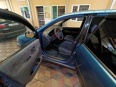 стекол: Toyota Picnic: 1997 г., 2 л, Механика, Газ, Минивэн — 5