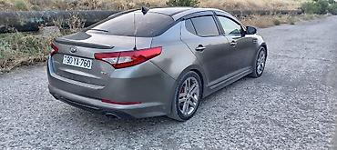 optima otracaqlar: Kia Optima sedan – SX paketi Mühərrik və ötürmə: - Benzinli mühərrik — 3