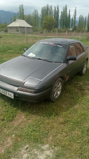 Mazda: Mazda 323: 1990 г., 1.6 л, Механика, Бензин, Седан