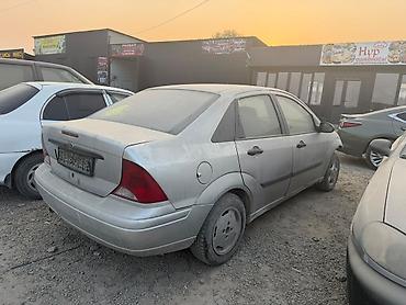 тоето корола: Ford Focus, седан, серебристого цвета. мотор кылыш керек Автомобиль — 3