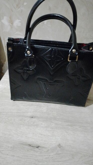 Eynəklər: Əl çantası, Louis Vuitton, İşlənmiş