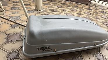 красный материал: Автобокс на крышу Thule Sidekick + поперечины - Компактный бокс на — 3