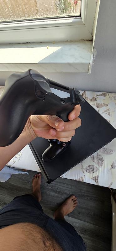 playstion 4: PlayStation 4 (PS4) Slim komplekt - Konsol: PS4 Slim, qara rəng — 1