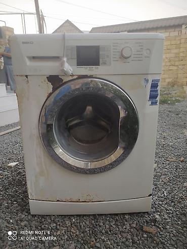 beko dispenser: Beko paltaryuyan maşın, ön yükləməli model. Üzərində görünən əsas — 2