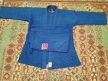 Kişi geyimləri: Mavi rəngdə judo kiminosu (gi) – komplekt: - Üst gödəkcə və şalvardan — 1