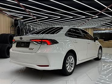 на corolla: Toyota Corolla: 2019 г., 1.8 л, Гибрид, Седан — 6