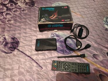 adapdir: İşlənmiş Smart TV boks Ünvandan götürmə