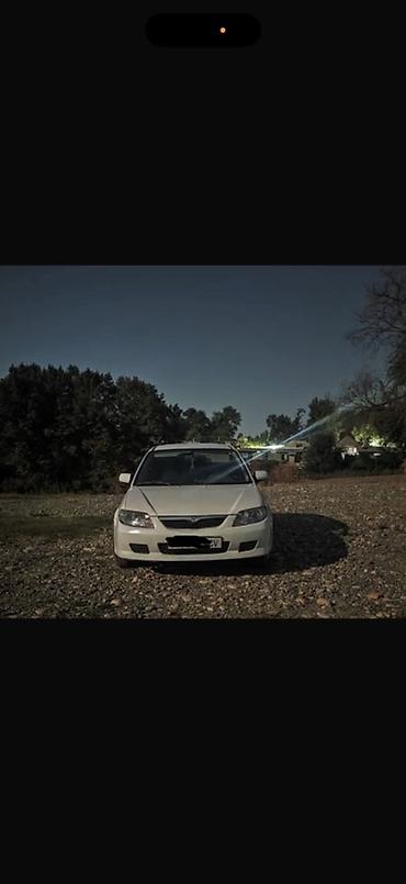 универса: Mazda Familia: 1999 г., 1.6 л, Механика, Бензин, Универсал — 3