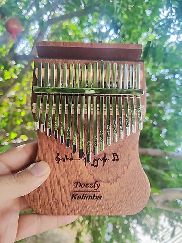 Ударные инструменты: Dozzly Kalimba – 17 dill - Musiqi aləti: Kalimba (baş barmaq — 2