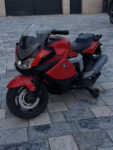 Детский электрический мотоцикл-байк BMW K1300 (красный) - at lalafo.kg Детский электрический мотоцикл-байк BMW K1300 (красный) -