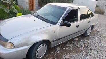 купить авто в кредит без первоначального взноса: СРОЧНО!!!!! Легковой автомобиль Daewoo Nexia серебристого цвета