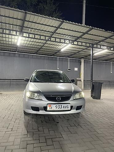 мини электро: Mazda 323: 2003 г., 1.3 л, Механика, Бензин, Хэтчбэк — 7