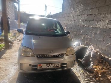 mini car: Daihatsu Cuore: 2003 г., Механика, Хэтчбэк — 2