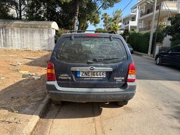 Mazda Tribute: 2 l | 2005 year SUV/4x4