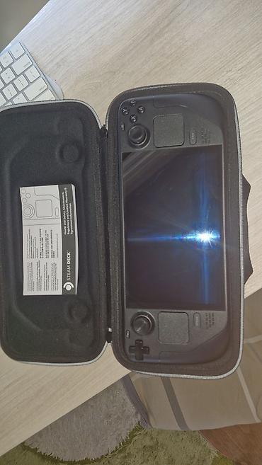 nintendo switch lite сколько стоит: Портативная игровая консоль Valve Steam Deck OLED, 512GB. Практически — 3