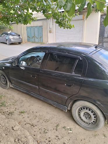 termostat opel astra f: Opel Astra: 1.6 l | 2000 il Sedan — 8