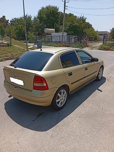 moto usta: Opel Astra: 1.4 l | 2005 il 33000 km Sedan — 7