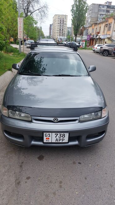 мазда автомобиль: Mazda Cronos: 1994 г., 1.8 л, Механика, Бензин, Хетчбек