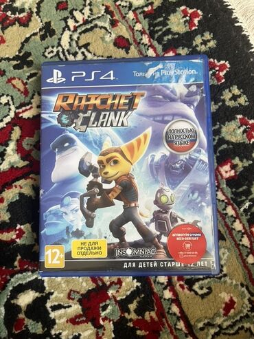 Oyun diskləri və kartricləri: PlayStation 4 üçün "Ratchet & Clank" oyunu. Bu, macəra və