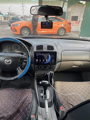 Mazda: Mazda 323: 2000 г., 1.6 л, Автомат, Газ, Хэтчбэк — 5