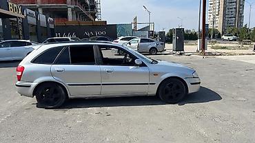 Mazda 323: 1999 г., 1.6 л, Универсал