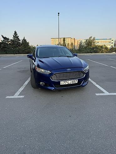 Транспорт: Ford Fusion sedan – mavi rəng, 4 qapı, ön və arxa park yerlərində — 1