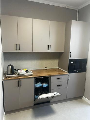 Кухонные гарнитуры: Кухонные гарнитуры на заказ - Современный минимализм: ровные фасады — 9