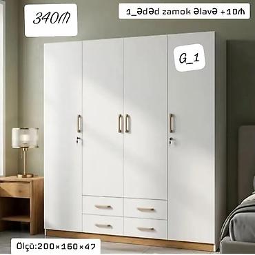 Ağ rəngli, müasir dizaynlı 4 qapılı dolab. Ölçüləri: - Hündürlük: 200