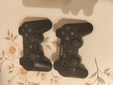 Другие игры и приставки: Sony PlayStation 3 slim usdunde 2 eded pultu 23 eded secilmə oyun var