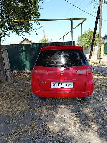 Продажа авто: Mazda Demio: 2003 г., 1.4 л, Механика, Бензин, Хэтчбэк — 5