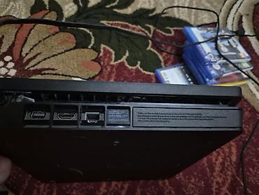 PlayStation 4 Slim, 512 ГБ. В комплекте: - 2 оригинальных геймпада — 9