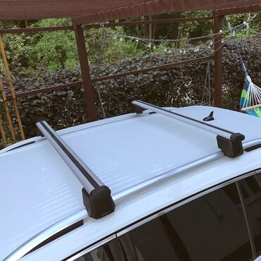 Багажники на крышу и фаркопы: Продам поперечки оригинал THULE на кия спортейдж сантафе соренто в