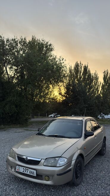 Mazda: Mazda 323: 2001 г., 1.5 л, Механика, Бензин, Седан