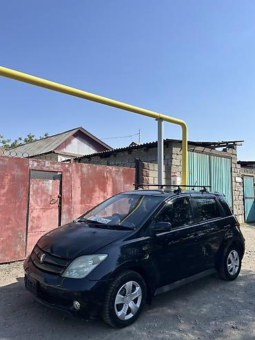 step wgn: Toyota Ist: 2002 г., 1.5 л, Автомат, Газ, Хэтчбэк — 2