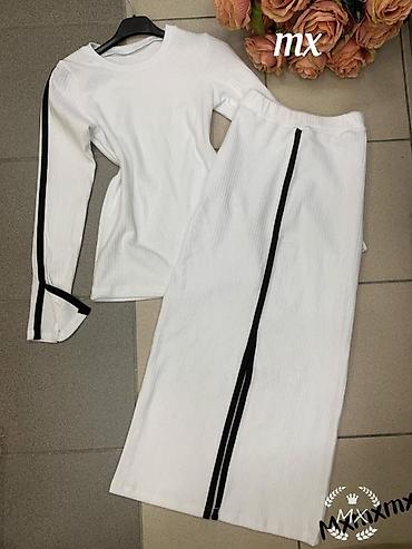 Kompleti: 🔥Zenski dvodelni komplet – džemper i suknja midi dužine
✅2200 din — 10