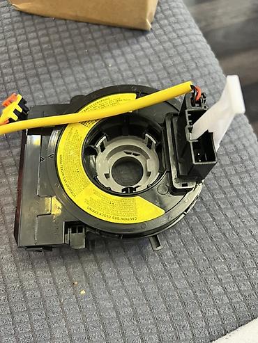 Lentlər: Məhsul: SRS/airbag sükan lent kabeli (clock spring) Təsvir: - Sükanın — 2