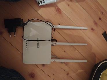 simsiz internet baki: Endirim var bater var Tenda Wi‑Fi router. 3 xarici antenalı modeldir — 1