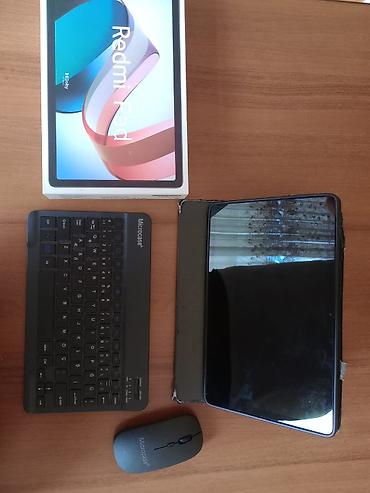 Xiaomi: Xiaomi Redmi Pad . Ustunde klaviatura və mause verilir, heç bi — 1