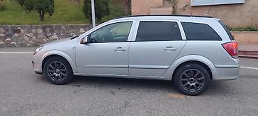 Opel: Opel Astra: 1.6 l | 2005 il Universal — 12
