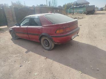 ваз лада 4: Mazda 323: 1993 г., 1.6 л, Механика, Бензин, Седан — 3