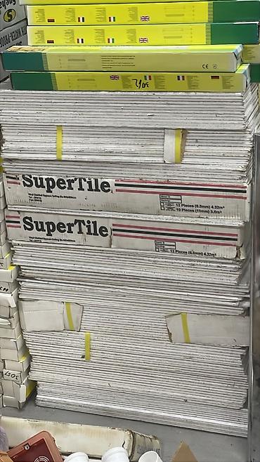 Asma tavan panelləri – SuperTile markası - Material: Vinil örtüklü