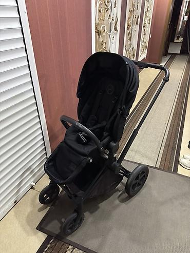 Коляски: Прогулочная коляска Cybex Priam 2 в чёрном цвете. Особенности: - — 2